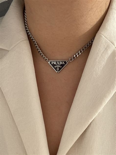 prada nexklace|Prada symbol necklace.